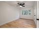 Bright bedroom with hardwood floors and large window at 592 Oyster Rake Dr, Kiawah Island, SC 29455