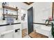 Bathroom with antique vanity and laundry access at 104 Tanager St, Summerville, SC 29483