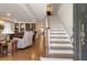 Elegant staircase with hardwood treads and white risers at 105 Folly Road Blvd, Charleston, SC 29407