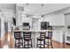 Modern kitchen with white cabinets, quartz countertops, and stainless steel appliances at 111 Dasharon Ln, Goose Creek, SC 29445