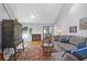 Living room with sectional sofa, fireplace, and high ceilings at 15 Palomino Ct, Charleston, SC 29407