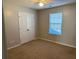 Bright bedroom featuring a double door closet and neutral wall paint at 192 Lindera Preserve Blvd, Summerville, SC 29486