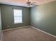Simple bedroom with light green walls and ceiling fan at 192 Lindera Preserve Blvd, Summerville, SC 29486