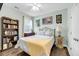 Cozy bedroom with bookcase and a queen-size bed at 2105 Bradham Rd, Charleston, SC 29412