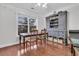 Dining area with hardwood floors, a table, and hutch at 2244 Ashley Crossing Dr # 214, Charleston, SC 29414