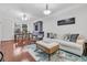 Bright living room with hardwood floors and comfy seating at 2244 Ashley Crossing Dr # 214, Charleston, SC 29414