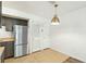 Galley kitchen with stainless steel appliances and tiled floor at 2494 Etiwan Dr # 3D, Charleston, SC 29414