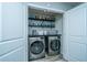 Laundry room with washer, dryer, and shelving at 268 Spencer Cir, Summerville, SC 29485