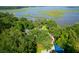 Waterfront property surrounded by lush vegetation at 4627 Shark Hole Rd, Meggett, SC 29449