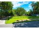 Home with black metal fence and lush green lawn at 4627 Shark Hole Rd, Meggett, SC 29449