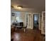 Living room with hardwood floors and view of bedroom at 1061 Greenhill Rd, James Island, SC 29412