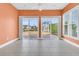 Bright sunroom with tile floor and pond view at 109 Billowing Sails St, Summerville, SC 29486