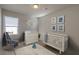 Charming Bedroom with a crib, dresser, and rocking chair, decorated in a nautical theme at 149 Winding Grove Ln, Moncks Corner, SC 29461