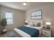 Bright bedroom with a queen bed, nightstands, and artwork above the bed at 149 Winding Grove Ln, Moncks Corner, SC 29461