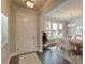 Elegant dining room with hardwood floors and a view to the backyard at 149 Winding Grove Ln, Moncks Corner, SC 29461