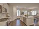 Modern kitchen with white cabinets, an island, and stainless steel appliances at 149 Winding Grove Ln, Moncks Corner, SC 29461