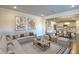 Spacious living room with an open floor plan and adjacent dining area at 149 Winding Grove Ln, Moncks Corner, SC 29461