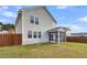 House with fenced backyard, screened porch, and grassy lawn at 223 Laurel Crest Way, Summerville, SC 29486