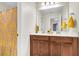 Double vanity bathroom with a large mirror and a yellow shower curtain at 223 Laurel Crest Way, Summerville, SC 29486