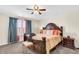 Main bedroom with ceiling fan and large bed at 223 Laurel Crest Way, Summerville, SC 29486