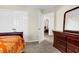 Bedroom with a sleigh bed, dresser, and access to another bedroom at 223 Laurel Crest Way, Summerville, SC 29486
