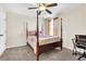 Bedroom with a post bed, ceiling fan, and a workspace at 223 Laurel Crest Way, Summerville, SC 29486