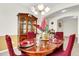 Well-lit dining room featuring a wooden table and hutch at 223 Laurel Crest Way, Summerville, SC 29486