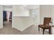 Upstairs hallway with a window and seating area at 223 Laurel Crest Way, Summerville, SC 29486