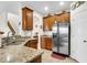 Spacious kitchen with granite countertops and stainless steel appliances at 223 Laurel Crest Way, Summerville, SC 29486