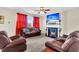 Living room with fireplace and comfortable leather seating at 223 Laurel Crest Way, Summerville, SC 29486