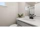Clean bathroom with gray vanity, white countertop and black fixtures at 226 Midtown Ave, Summerville, SC 29486