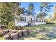 Single-wide manufactured home with vinyl siding and a landscaped yard at 245 W Medina St, Summerville, SC 29483