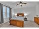 Bedroom with wooden bed frame, nightstands, and window with curtains at 823 Recess Point Dr, Moncks Corner, SC 29461