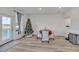 Bright dining area with table, chairs, and access to a balcony at 823 Recess Point Dr, Moncks Corner, SC 29461