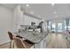 Modern kitchen with granite countertops, stainless steel appliances, and an island at 823 Recess Point Dr, Moncks Corner, SC 29461
