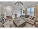 Cozy living room with a neutral color palette, plush sofas, and a wood coffee table at 823 Recess Point Dr, Moncks Corner, SC 29461
