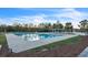 Community pool with a pergola and surrounding landscaping at 823 Recess Point Dr, Moncks Corner, SC 29461
