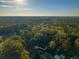 House nestled in a wooded area, aerial view at 109 Beacon Ave, Moncks Corner, SC 29461