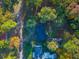 Overhead view of a ranch style house with a dark roof, surrounded by trees at 109 Beacon Ave, Moncks Corner, SC 29461