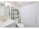Basement bathroom with shower/tub combo and shelving at 109 Beacon Ave, Moncks Corner, SC 29461