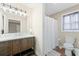 Clean bathroom, featuring a large vanity and shower at 109 Beacon Ave, Moncks Corner, SC 29461