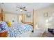 Spacious bedroom with a post bed, TV, and ample closet space at 109 Beacon Ave, Moncks Corner, SC 29461