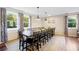 Large dining room with a long table and plenty of seating at 109 Beacon Ave, Moncks Corner, SC 29461
