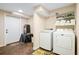 Basement laundry room with washer, dryer and storage at 109 Beacon Ave, Moncks Corner, SC 29461