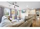 Spacious living room featuring comfortable sofas and large windows at 109 Beacon Ave, Moncks Corner, SC 29461