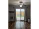 Living room with sliding glass doors leading to the backyard at 114 Lewisfield Dr, North Charleston, SC 29418