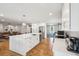 Open concept kitchen with large island, stainless steel appliances, and hardwood floors at 1592 Boston Grill Road, Mount Pleasant, SC 29466