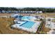 Community pool with lap lanes and a leisure pool with water features at 314 Black Birch Dr, Summerville, SC 29486