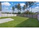 Spacious backyard with grassy lawn, wooden fence, and concrete patio at 314 Black Birch Dr, Summerville, SC 29486