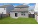 Gray house exterior with backyard and wooden fence at 314 Black Birch Dr, Summerville, SC 29486